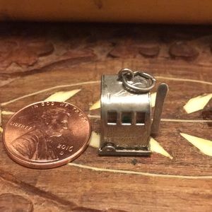 Vintage movable sterling silver slot charm